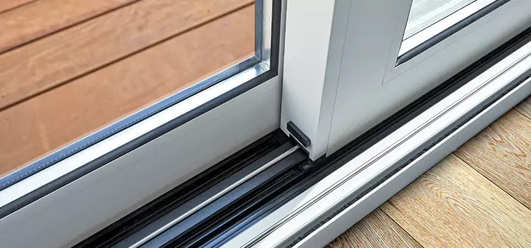Why Your Sliding Door Keeps Getting Stuck in Needham, MA?